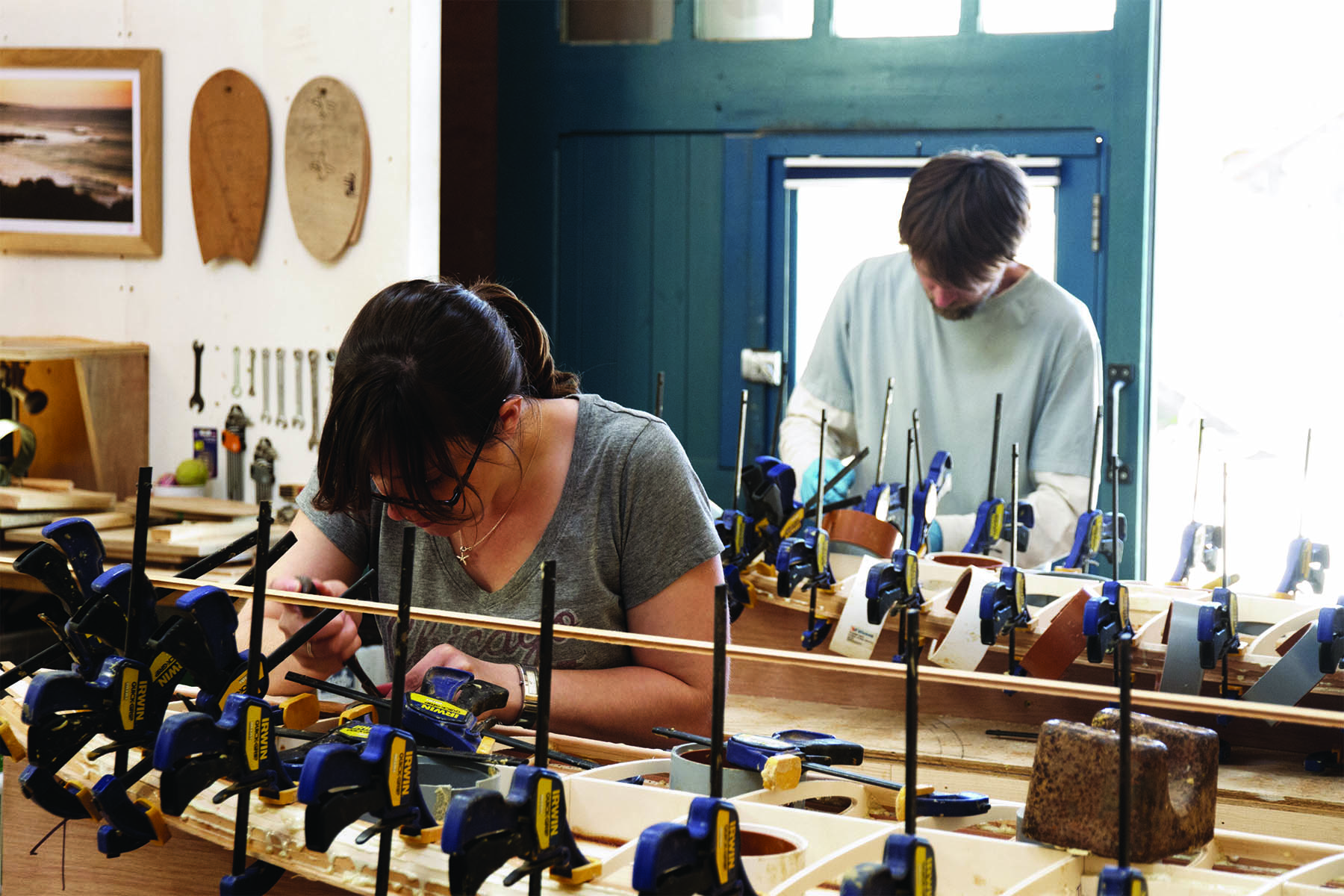 Helen and Duncan otter wooden surfboard workshop cornwall july 2014 helen and duncan heads down with rail strips