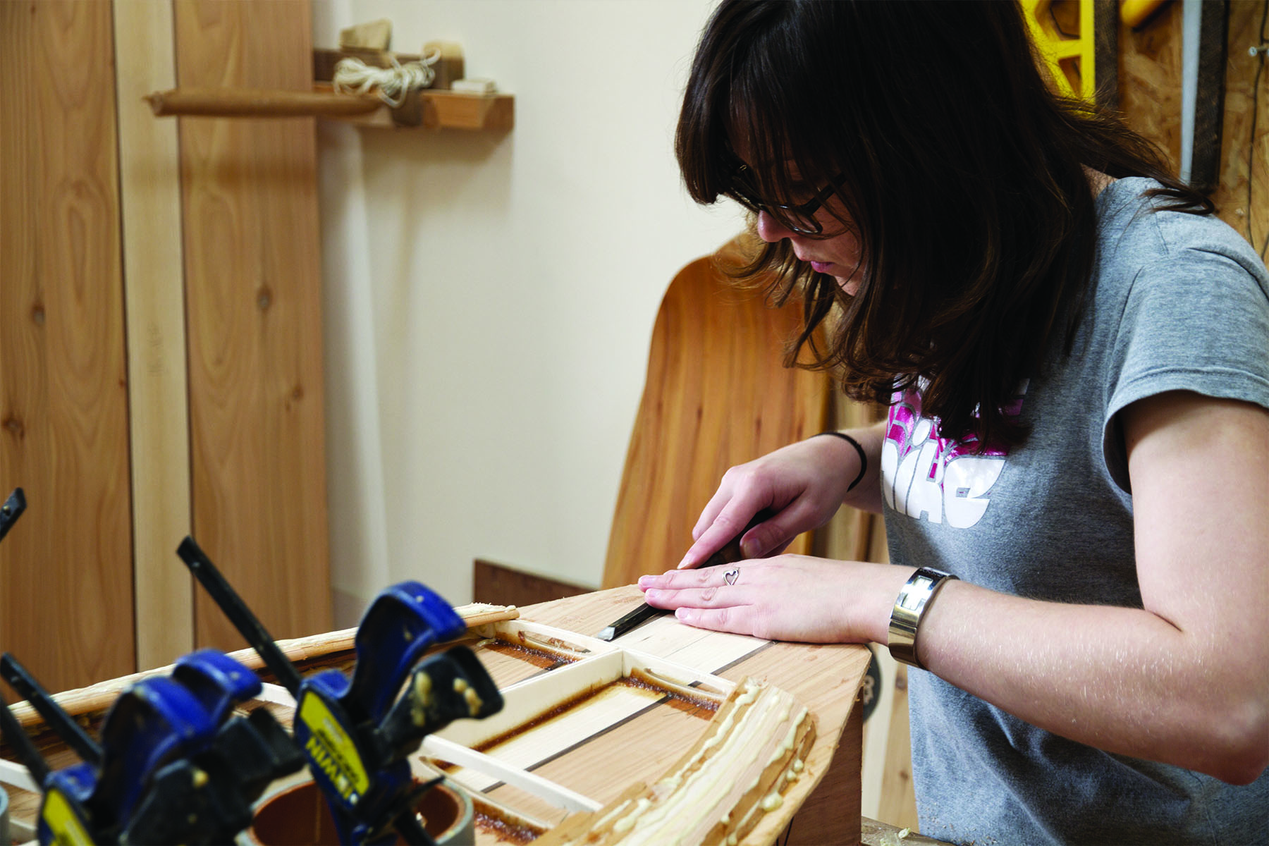 Helen and Duncan otter wooden surfboard workshop cornwall july 2014 helen chiseling nose