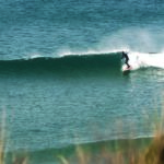 Mat Arney surfing the Otter Surfboards wooden Pier in mid-winter at Gwithian