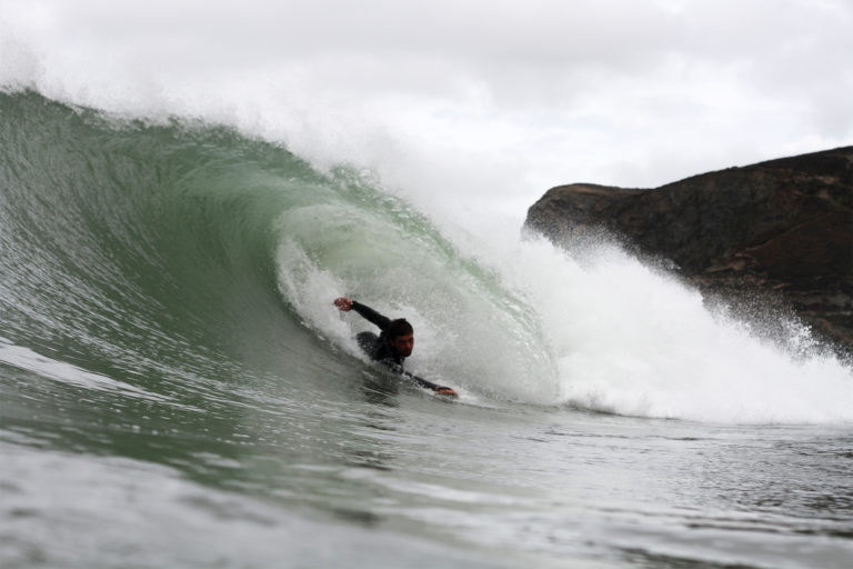 Chris bodysurf barrel at Aggie