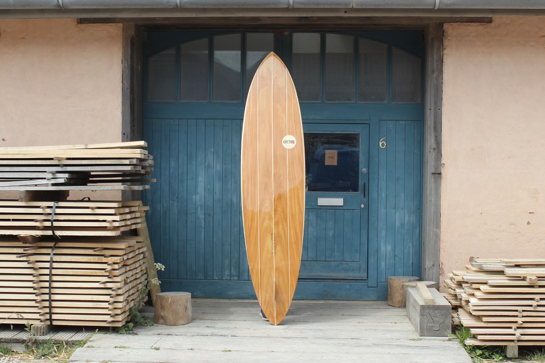 finished wooden surfboard otter surfboards workshop cornwall Clipper classic pin tail single fin