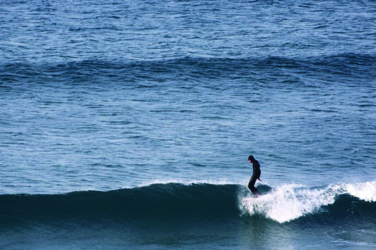 Mat Arney surfing the Otter Surfboards wooden Pier in mid-winter at Gwithian