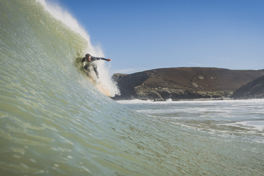 Matt Smith late drop on an Otter wooden surfboard coaster at St Agnes, Cornwall