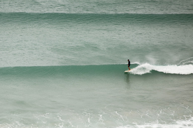 Marcus in trim on the Otter Surfboards Wooden Coaster at Chapel Porth, Cornwall.