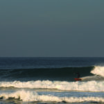 James Otter fetch wooden surfboard bottom turn