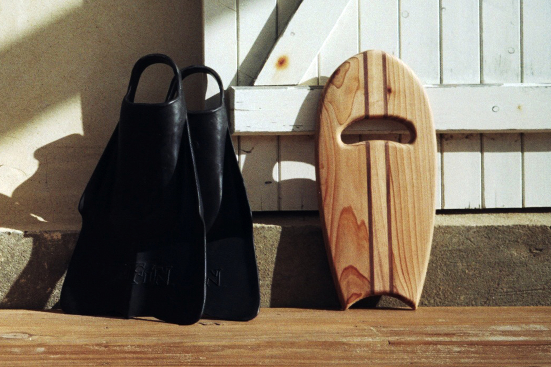 Otter Wooden bodysurfing Handplane and Da Fins product shot in france by Mat Arney close up