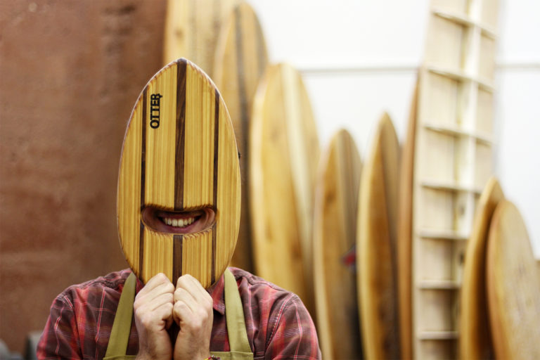 Otter Wooden bodysurfing pebble Handplane and product shot in workshop