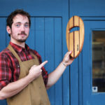 Otter Wooden bodysurfing pebble Handplane and product shot in workshop