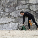 James Otter Wooden bodysurfing Handplane and Da Fins product shot on portreath beach by Mat Arney