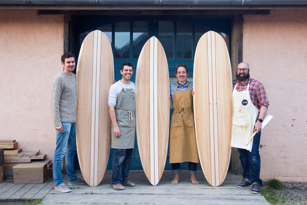 Greg Jonathan James Otter and Stuart outside the otter workshop with their wooden surfboards