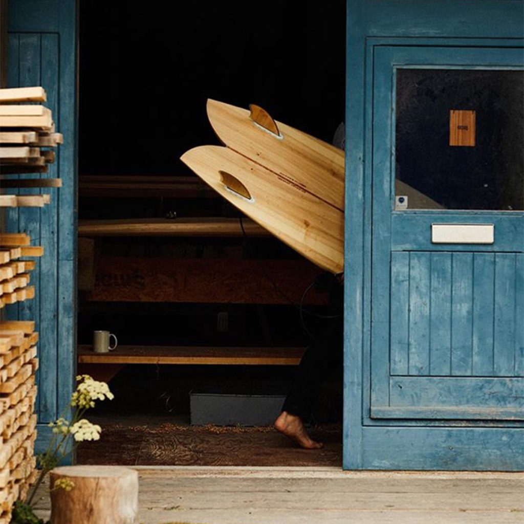 Tom Cockram Board diasppearing into workshop