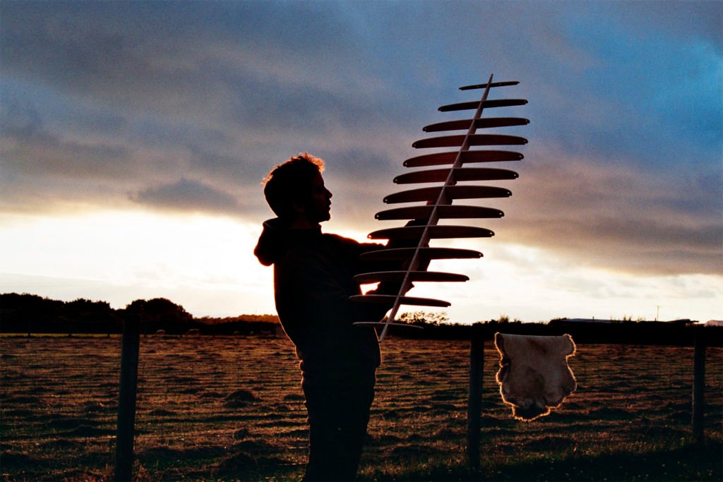 The Storyboard by James Otter and Mat Arney Wooden Surfboard Project frame in the sunset