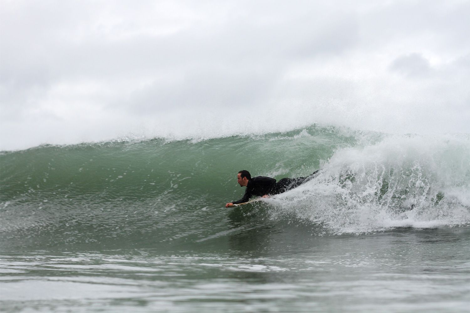 wooden bellyboard bodysurfer otter wave
