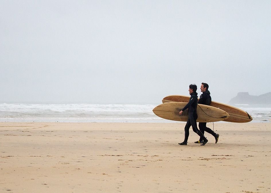 Otter wooden surfboards beach walk surfers