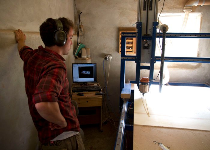 James Otter cutting ribs for ben skinner sas wooden surfboard gun
