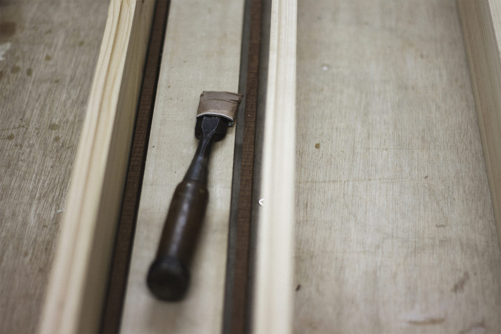 japanese chisel in otter surfboards workshop