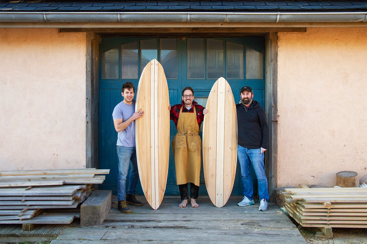 otter workshop finished boards blue doors wooden surfboard