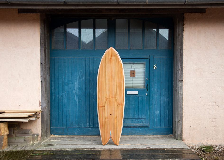 Woodburer blue doors otter wooden surfboard