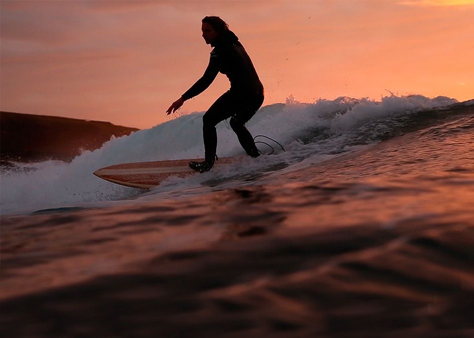 Easkey Britton summer solstice otter wooden surfboard fish sun set