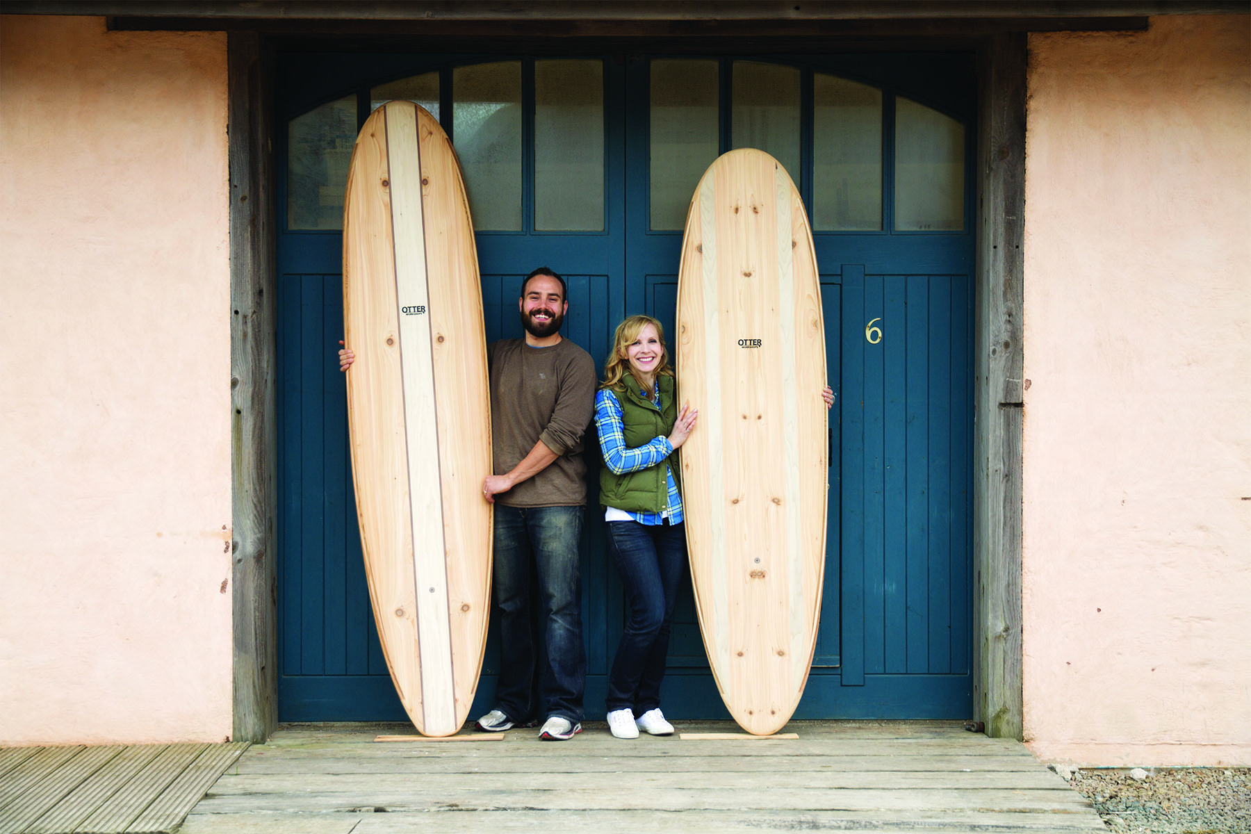 Kim and Shelby wooden surfboard making in the otter workshop in cornwall portrait 2