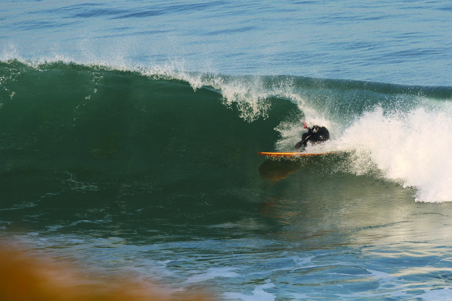 Chris barrel or head dip on jetty otter wooden surfboard