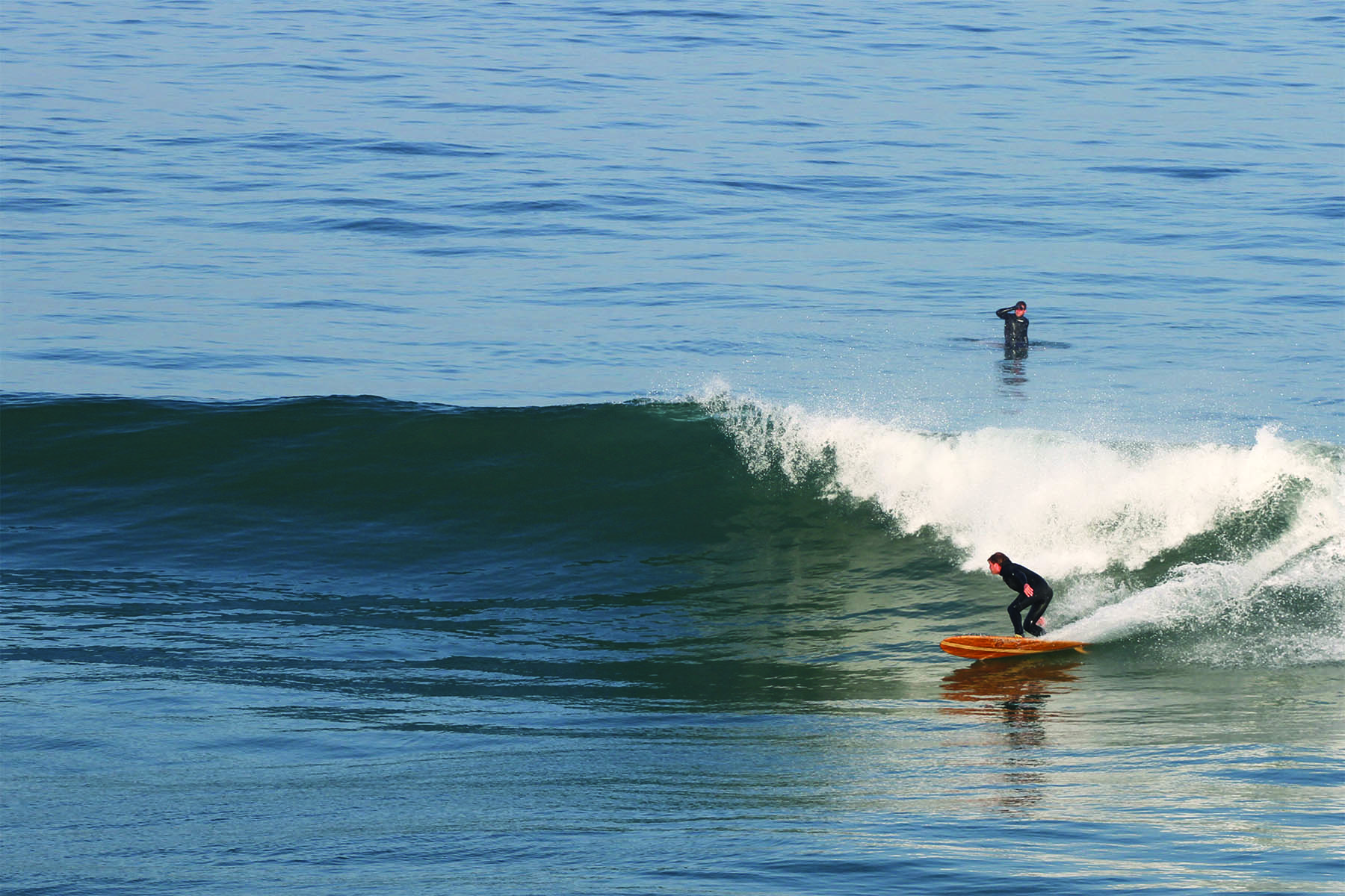 Gideon Bottom Turn on Island Hopper Otter Wooden Surfboard