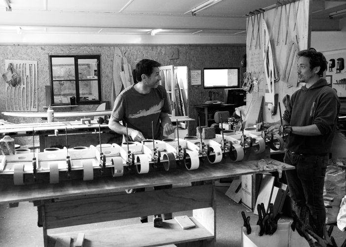 Tim and James Otter makning a wooden longboard surfboard workshop