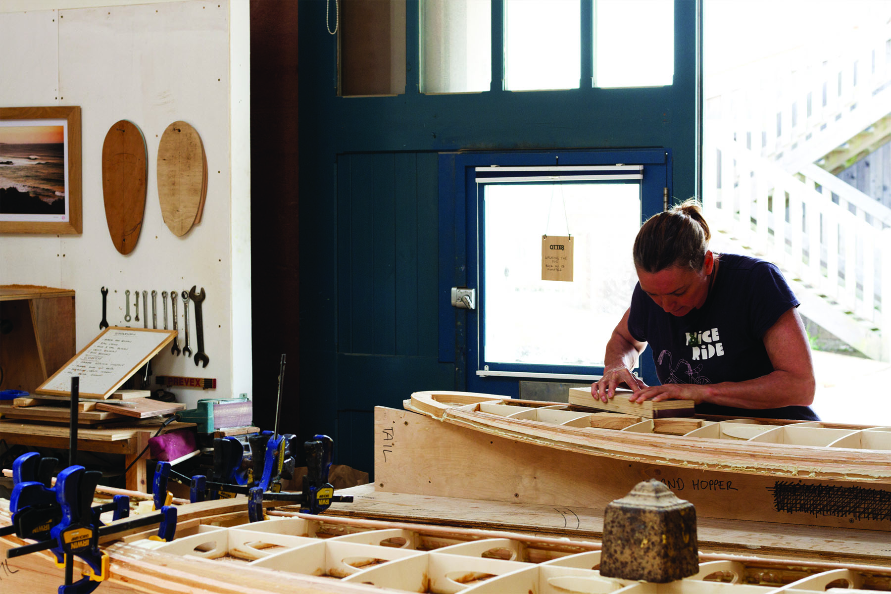 Tracy Martin and Paul Otter wooden surfboard workshop June 2014 tracy sanding