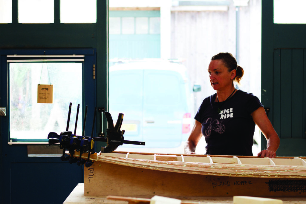 Tracy Martin and Paul Otter wooden surfboard workshop June 2014 tracy glue tail