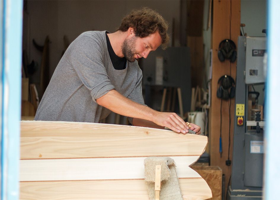 Otter wooden surfboard workshop fish tail shaping