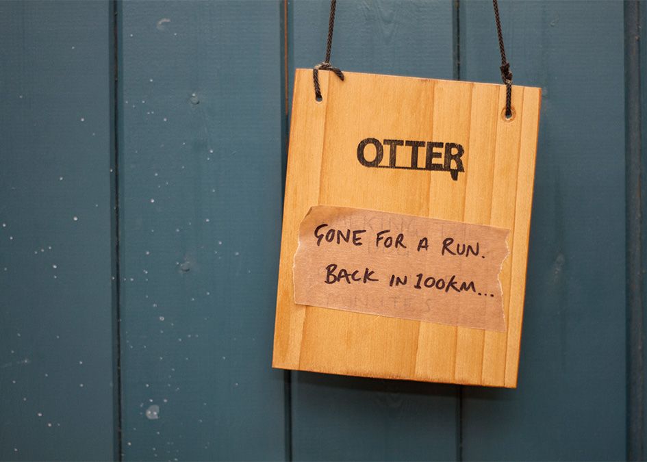 Otter sign blue door workshop