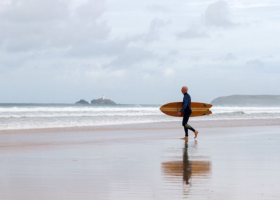 Otter wooden surfboard fish surfer walk beach