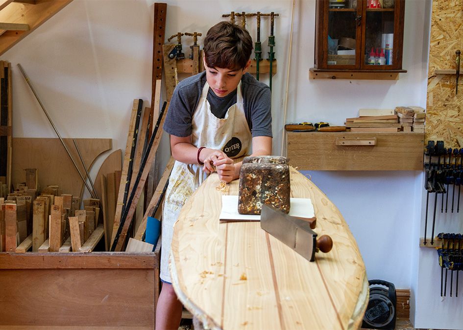 Otter wooden surfboard workshop shaping