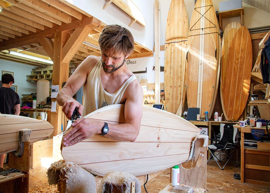 Otter wooden surfboard workshop shaping