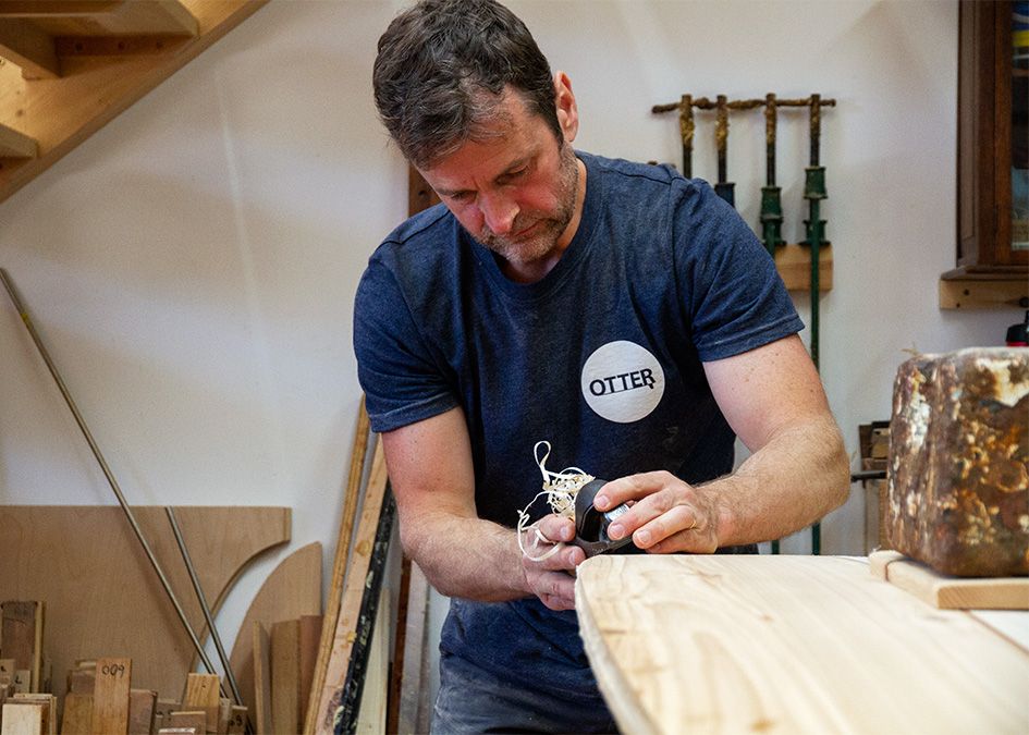 Otter wooden surfboard workshop shaping