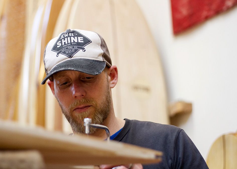 otter wooden surfboard workshop shaping tail fish