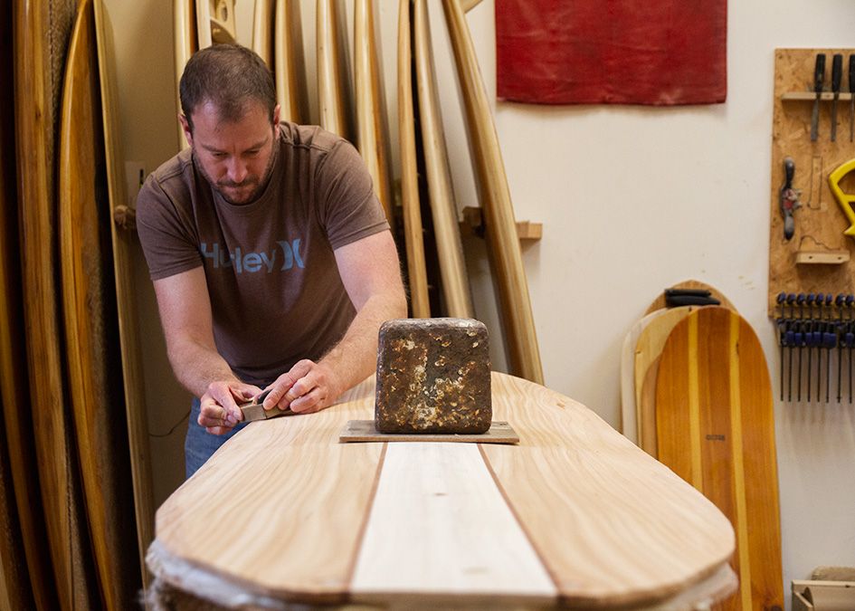 otter wooden surfboard workshop shaping