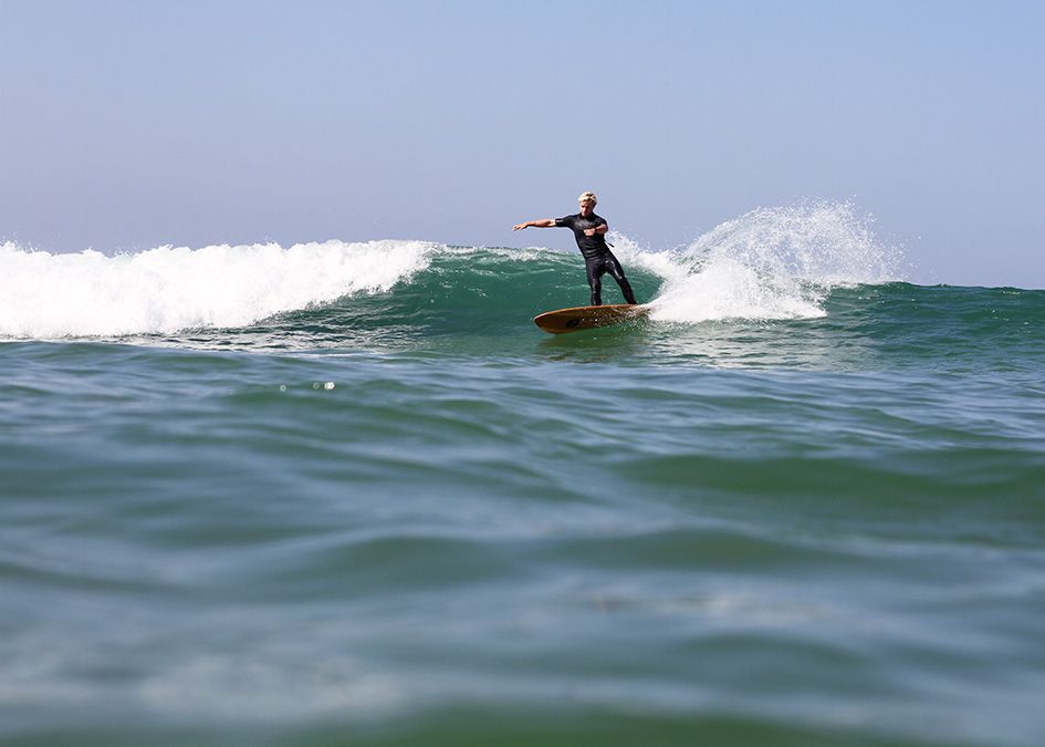 Otter wooden surfboard wave surfer