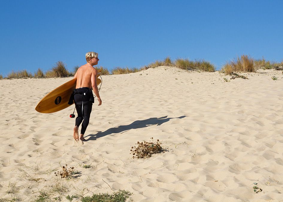 Otter wooden surfboard beach surfer
