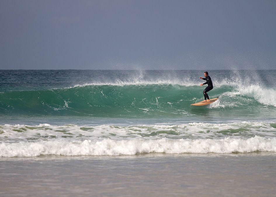 Otter wooden surfboard wave surfer