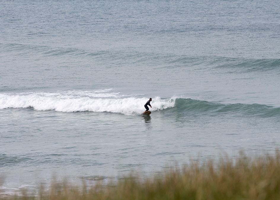 Otter wooden surfboard wave surfer