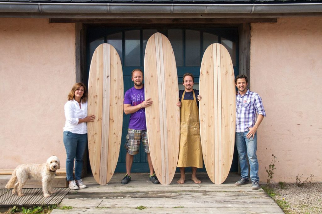 otter wooden surfboard workshop blue doors Laurence Henrik and Mark James Otter