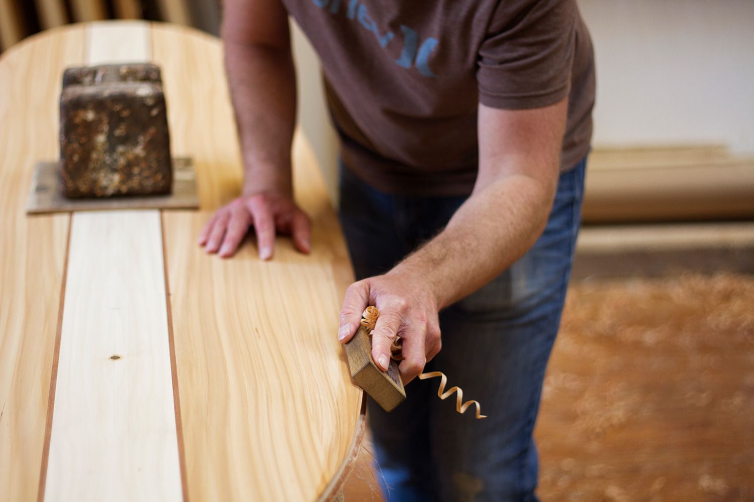 otter wooden surfboard workshop shaping