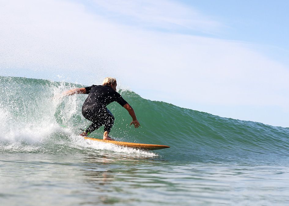 Otter wooden surfboard wave surfer