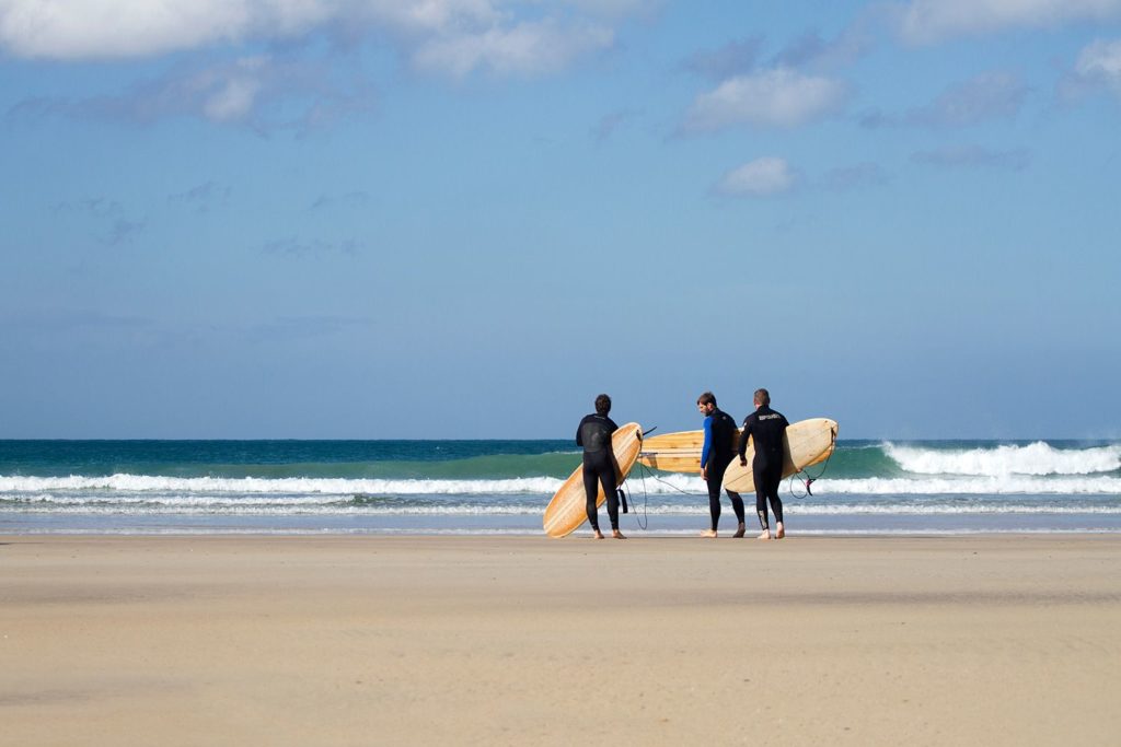 otter wooden surfboards surfers beach