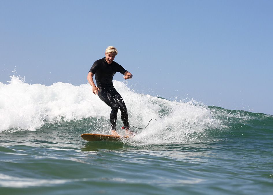 Otter wooden surfboard wave surfer