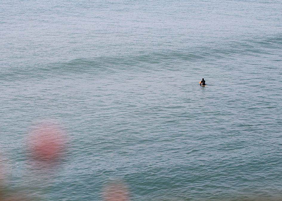 surfer lineup sitting