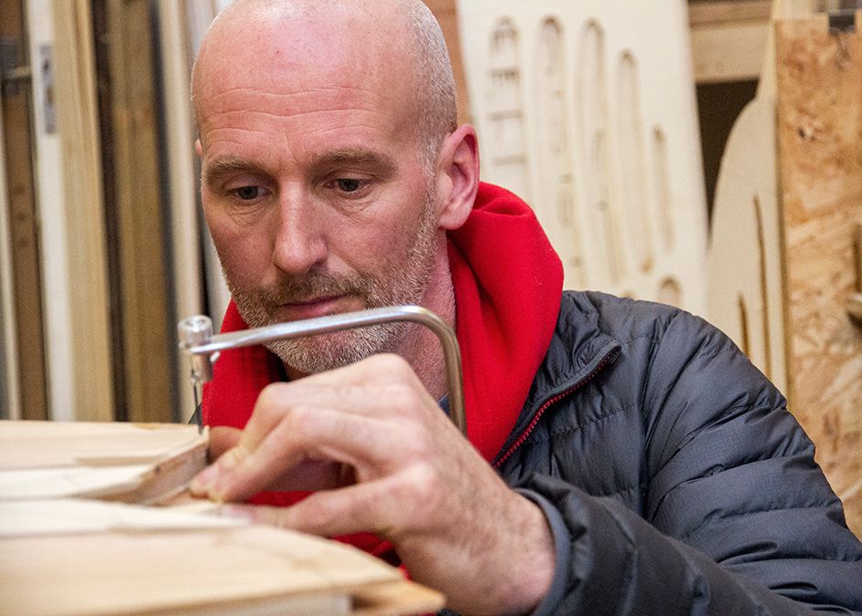 otter wooden surfboard workshop shaping tail fish