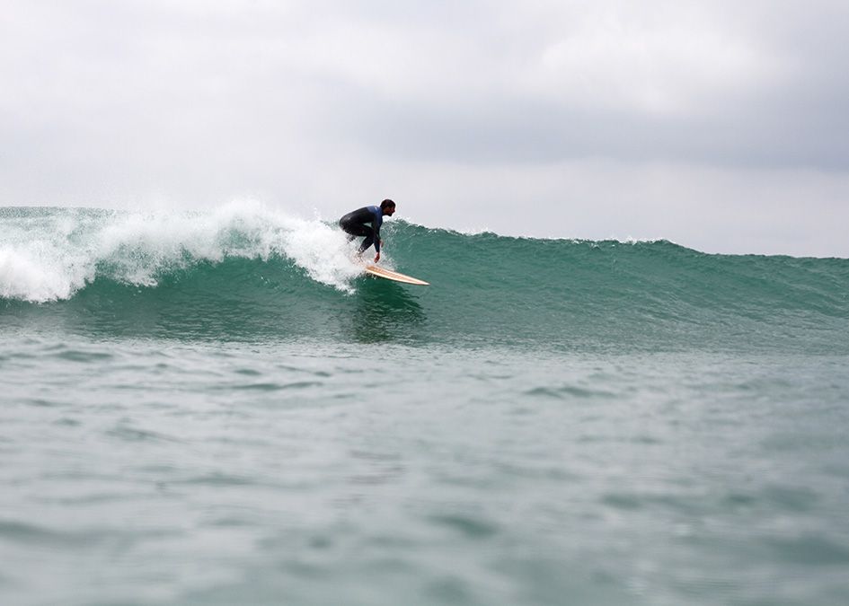 Otter wooden surfboard surfer wave