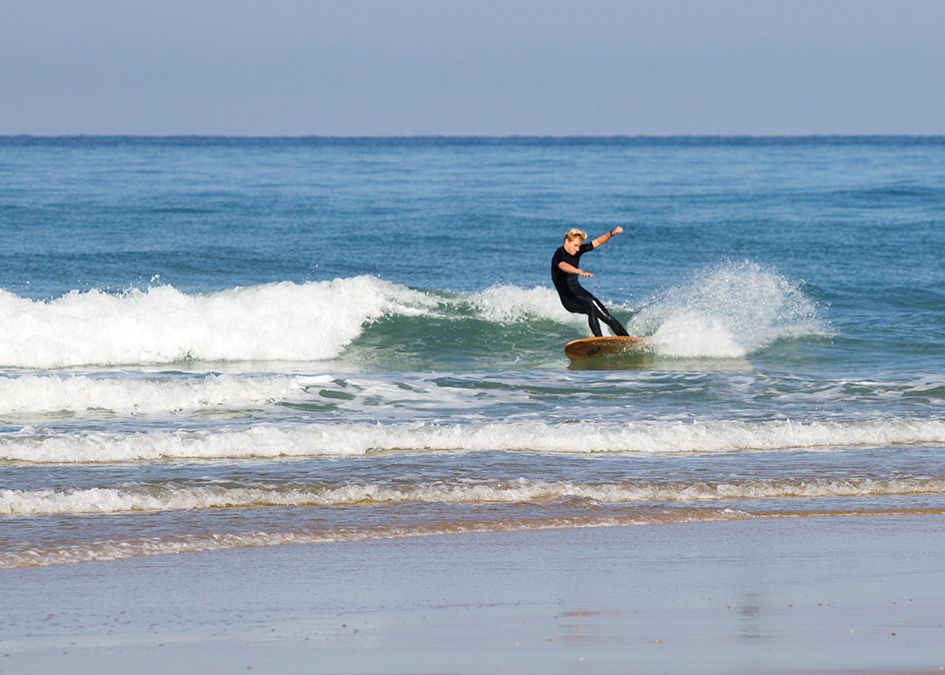Otter wooden surfboard wave surfer